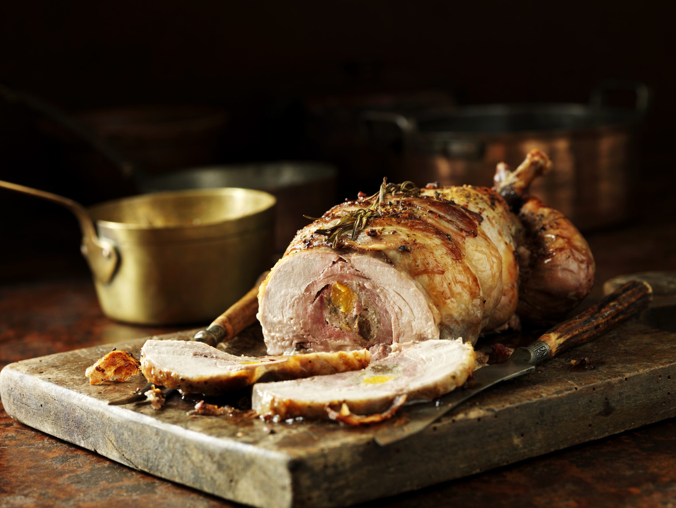 Carved three game bird roast for christmas lunch